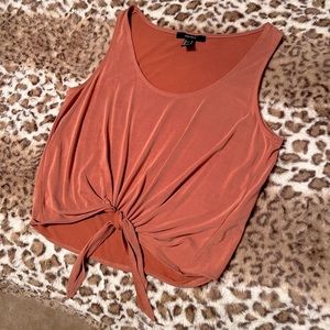 Forever 21 Rose Pink tank top with tie at the bottom; Only worn once.